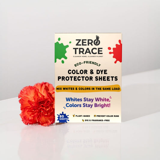 A box of Zero Trace Color & Dye Protector Sheets is displayed next to a red and orange carnation on a white surface.