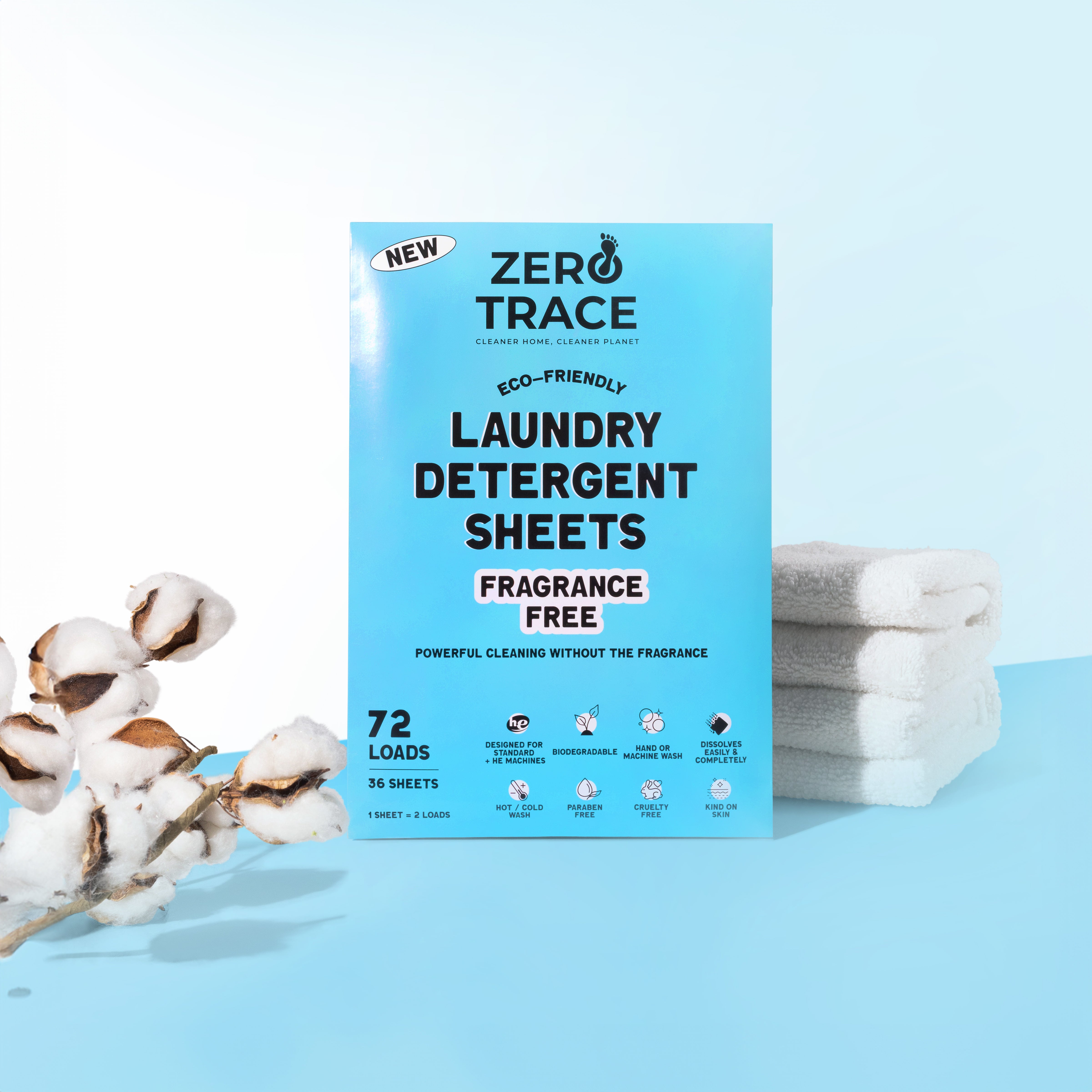 A blue package with white towels and cotton flowers, Zero Trace laundry detergent sheets, safe and eco-friendly.
