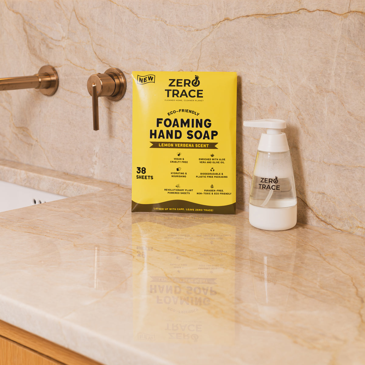 An eco-friendly bathroom sink with a bottle of Zero Trace Hand Soap Sheets next to it.