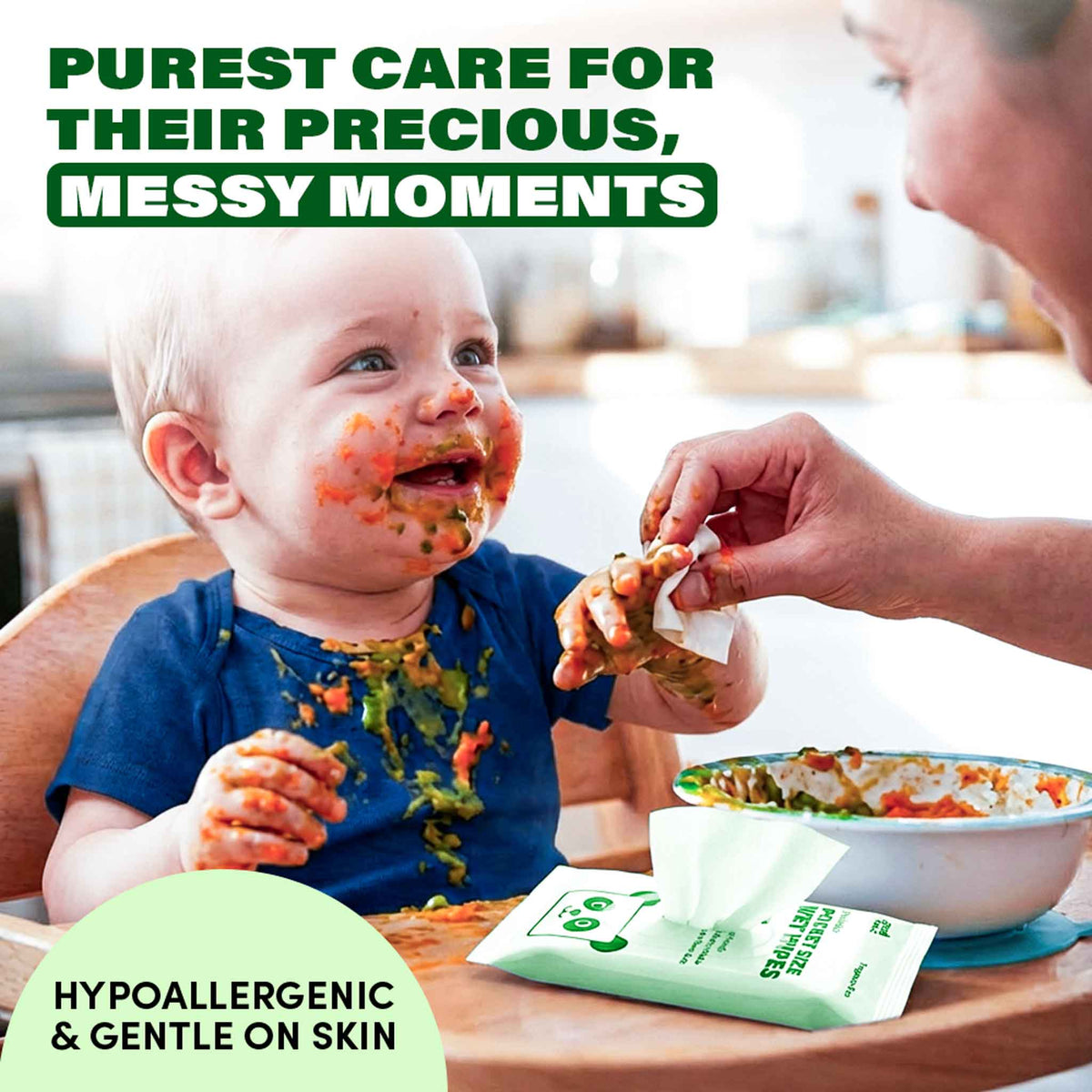 An adult wipes food from a baby's face and hands using Zero Trace Flushable Pocket Wipes with Aloe & Vitamin E; a pack of biodegradable Zero Trace wipes is visible on the table.