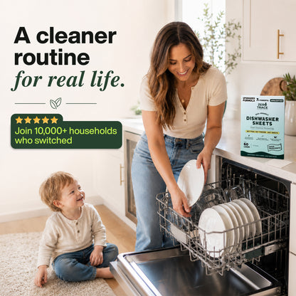 A woman loads dishes into the dishwasher next to her smiling child, while a box of Zero Trace Dish Washer Sheets—plant-based and plastic-free—sits on the counter, accompanied by promotional text highlighting eco-friendly cleaning.